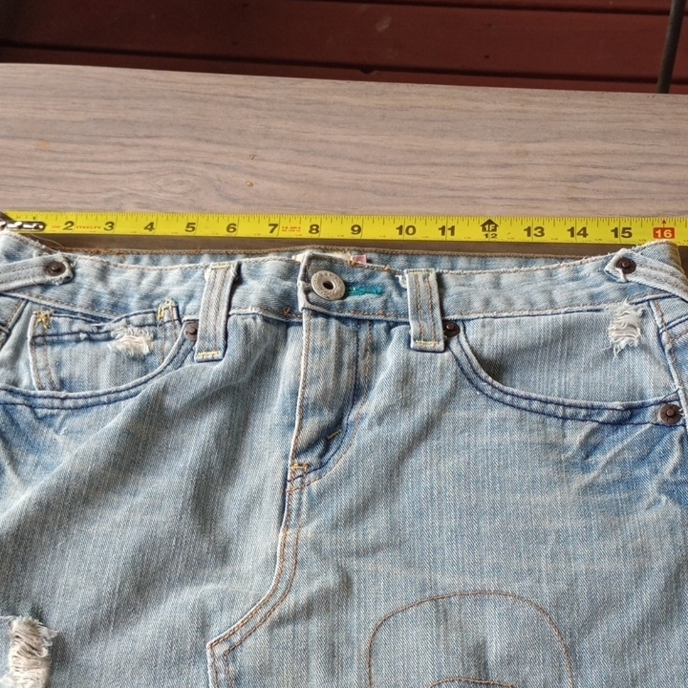 Levi's‎ Denim Mini Skirt with Distressed Accents - Picture 11 of 15